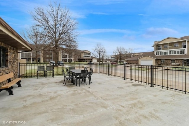 view of patio featuring a garage