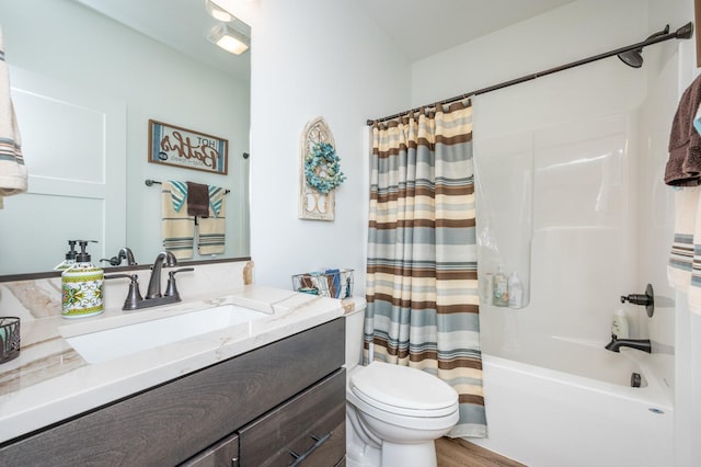 full bathroom featuring vanity, shower / tub combo with curtain, and toilet