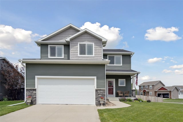 view of front facade featuring a garage, a porch, and a front yard