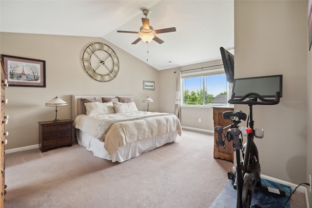 carpeted bedroom featuring vaulted ceiling and ceiling fan