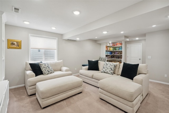 living room featuring light colored carpet