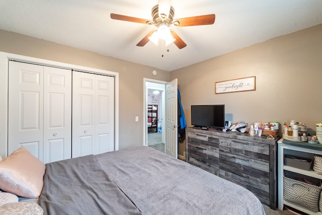 bedroom with a closet and ceiling fan