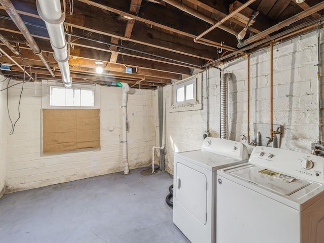 laundry area with washing machine and clothes dryer