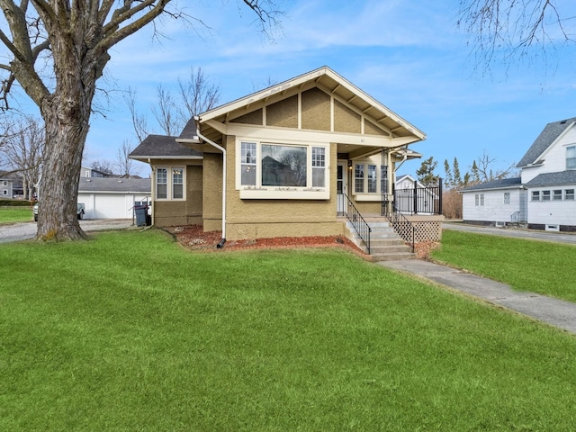 view of front of home featuring a front yard and covered porch