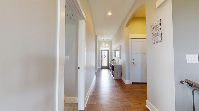 hall featuring dark wood-type flooring