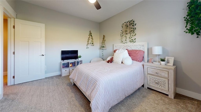 bedroom with vaulted ceiling, ceiling fan, and carpet