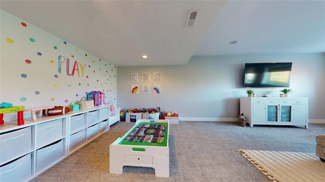 rec room with light carpet