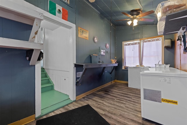 bathroom with wood-type flooring and ceiling fan