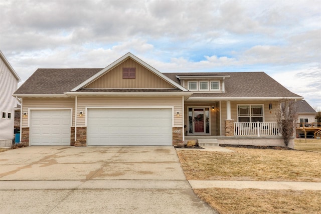 view of front of home featuring a garage and covered porch