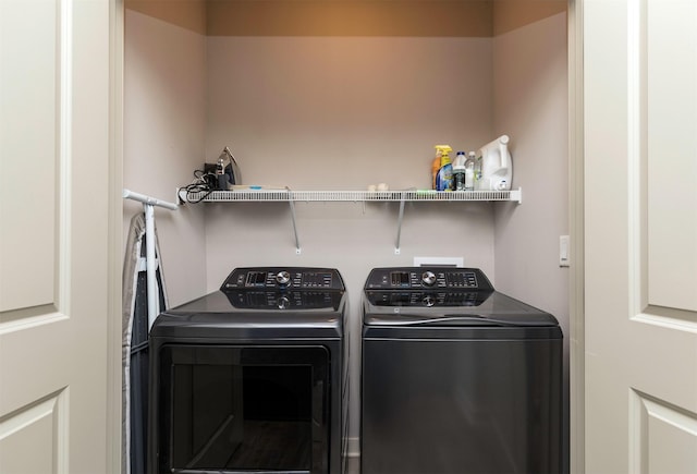 washroom featuring independent washer and dryer