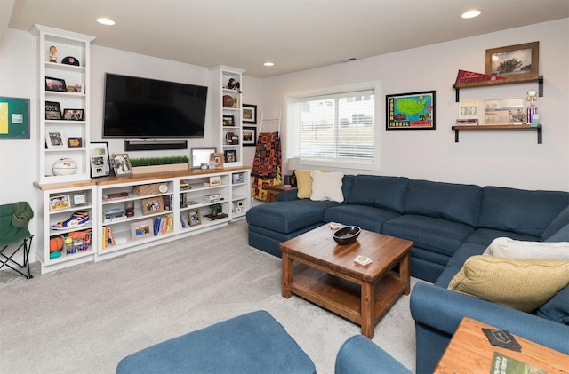 living room featuring light colored carpet