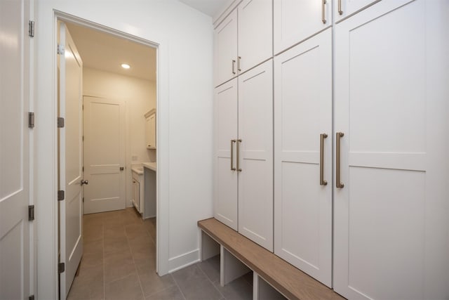 mudroom with tile patterned flooring