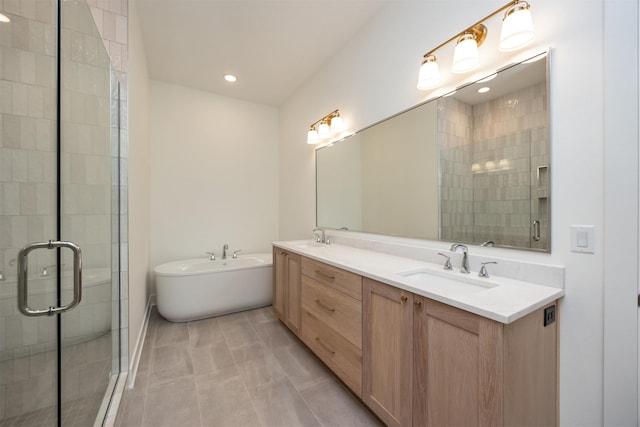 bathroom featuring vanity, plus walk in shower, and tile patterned flooring