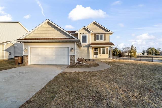 view of front of house with a garage and covered porch