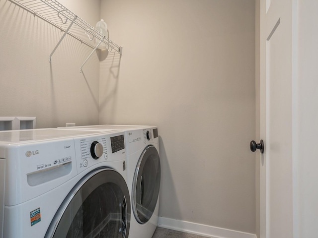 laundry room featuring independent washer and dryer