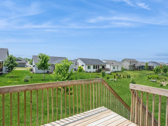 wooden deck with a yard