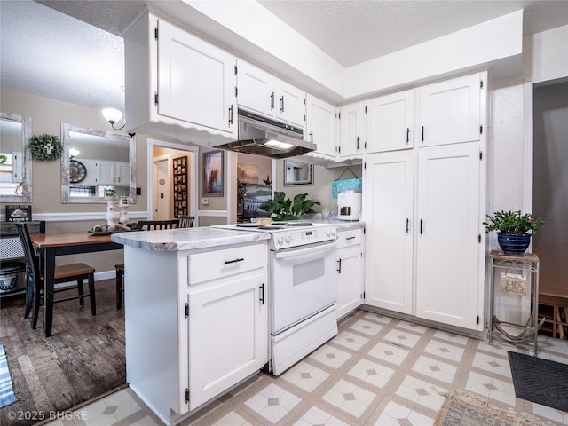 kitchen with white cabinetry, white electric stove, kitchen peninsula, and a textured ceiling