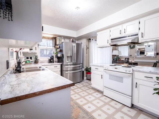 kitchen featuring white cabinetry, sink, white range with electric cooktop, stainless steel refrigerator with ice dispenser, and a textured ceiling