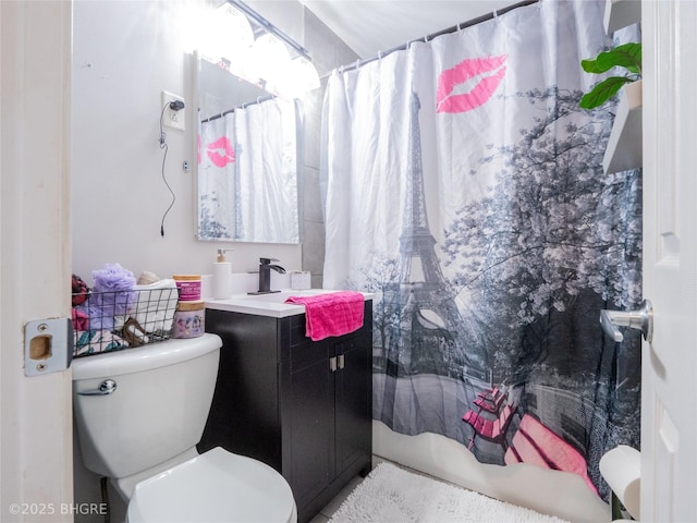 bathroom with vanity, walk in shower, and toilet