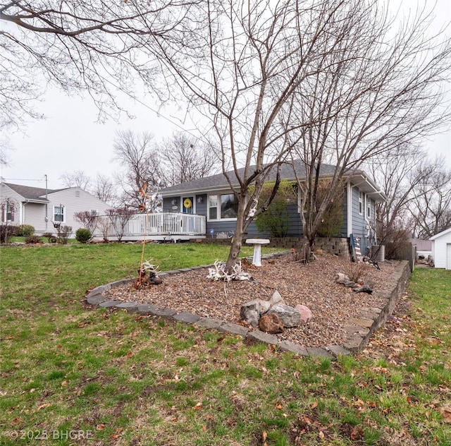 view of yard with a wooden deck