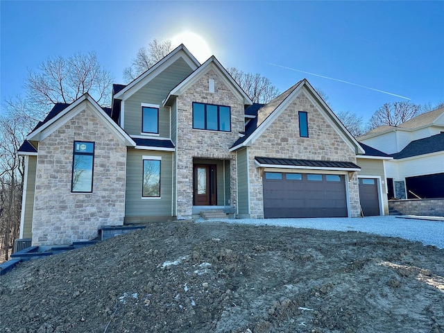 view of front of house featuring an attached garage and driveway