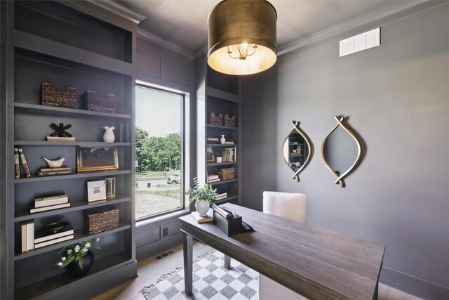10430 Thorne Dr, West Des Moines, IA 50266 - office area with crown molding and built in shelves