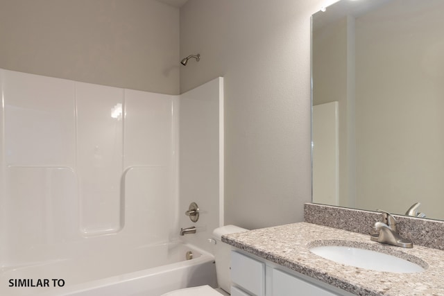 full bathroom featuring vanity, shower / bathtub combination, and toilet