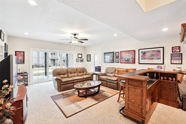 14102 Ridgemont Dr, Urbandale, IA 50323 - living area featuring ceiling fan, carpet floors, a healthy amount of sunlight, and recessed lighting
