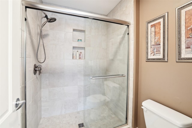 14102 Ridgemont Dr, Urbandale, IA 50323 - full bathroom with a shower stall and toilet