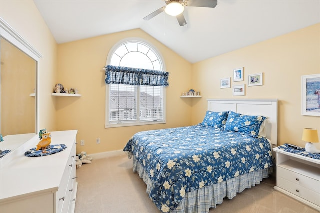 14102 Ridgemont Dr, Urbandale, IA 50323 - carpeted bedroom with vaulted ceiling, a ceiling fan, and baseboards
