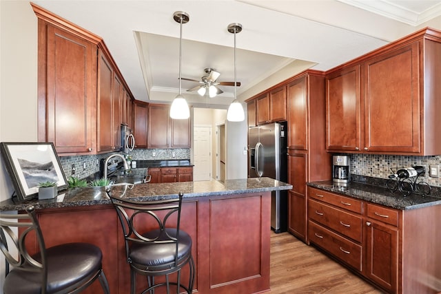 14102 Ridgemont Dr, Urbandale, IA 50323 - kitchen featuring ornamental molding, appliances with stainless steel finishes, and a ceiling fan