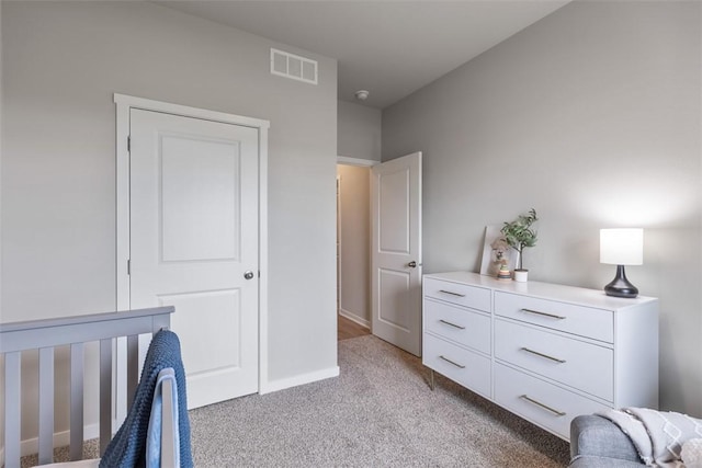 bedroom with light carpet