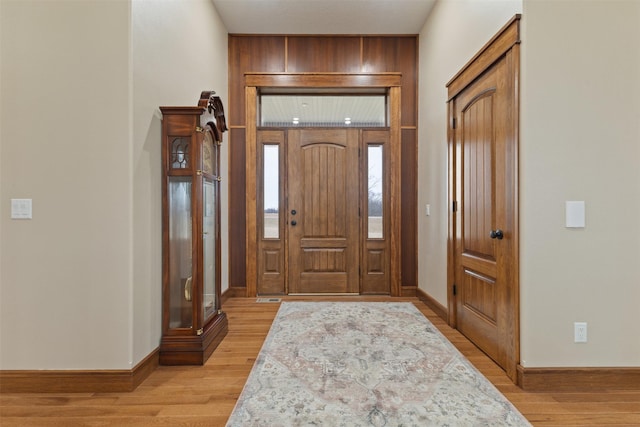 foyer with light wood-type flooring