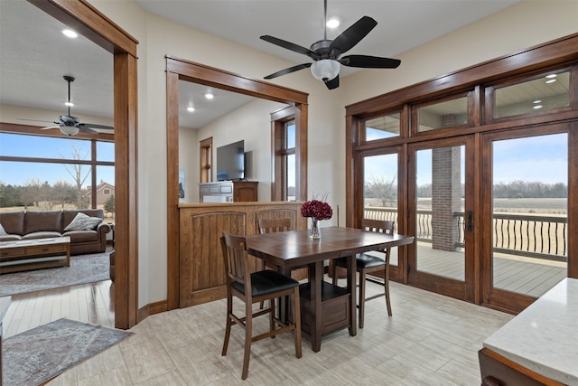 dining space with ceiling fan