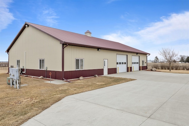 view of property exterior with a garage