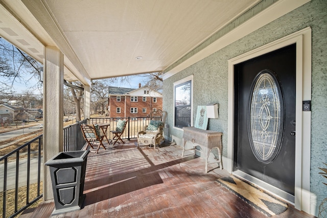 entrance to property with covered porch