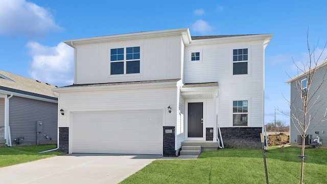 view of front of house with an attached garage, a front lawn, stone siding, concrete driveway, and central AC