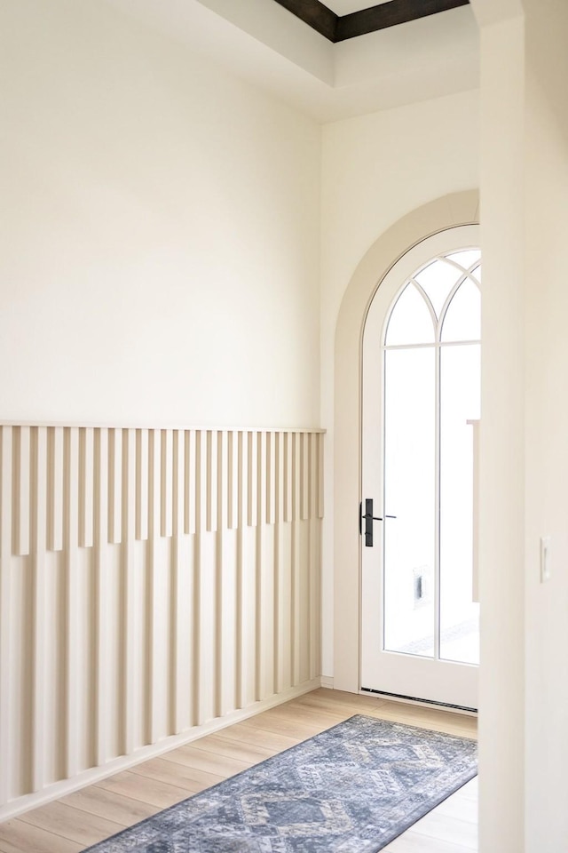 entryway with wood-type flooring