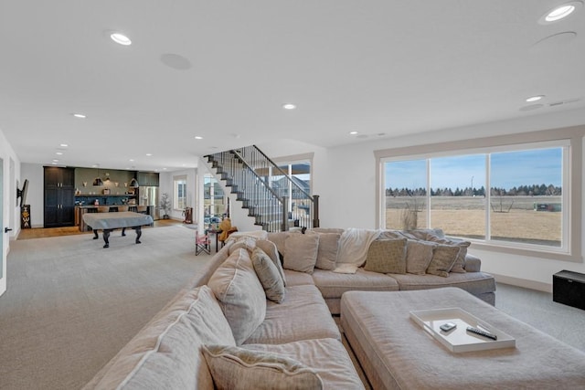 living room featuring light carpet