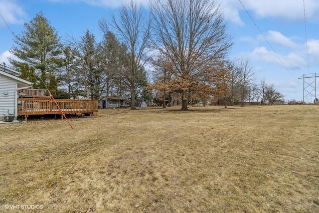 view of yard featuring a deck