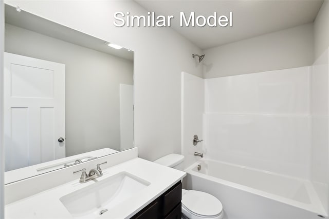 full bathroom featuring shower / bathtub combination, vanity, and toilet