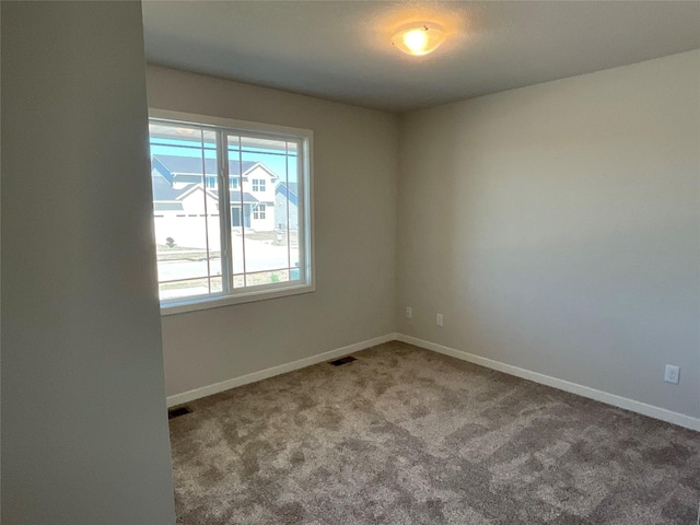 3423 5th Ave SE, Altoona, IA 50009 - carpeted empty room with baseboards