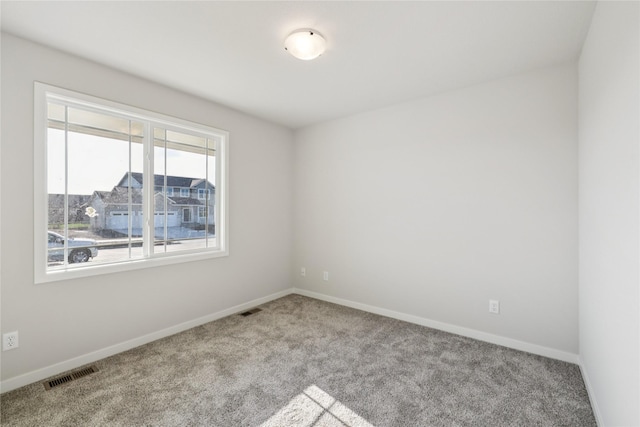 3423 5th Ave SE, Altoona, IA 50009 - unfurnished room with carpet and baseboards