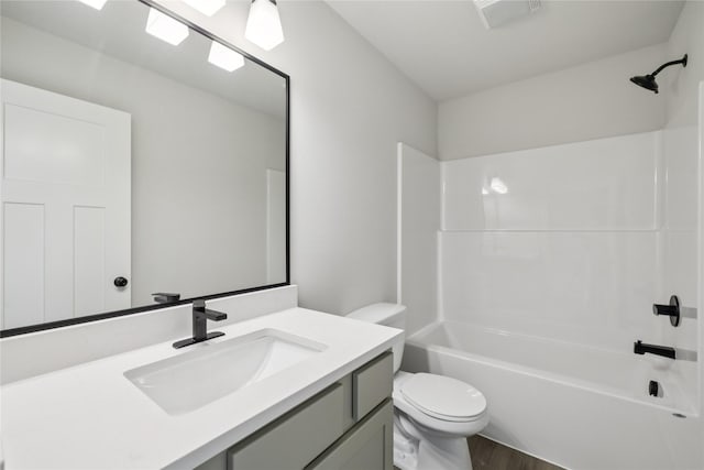 3423 5th Ave SE, Altoona, IA 50009 - full bath with vanity, shower / washtub combination, and wood finished floors