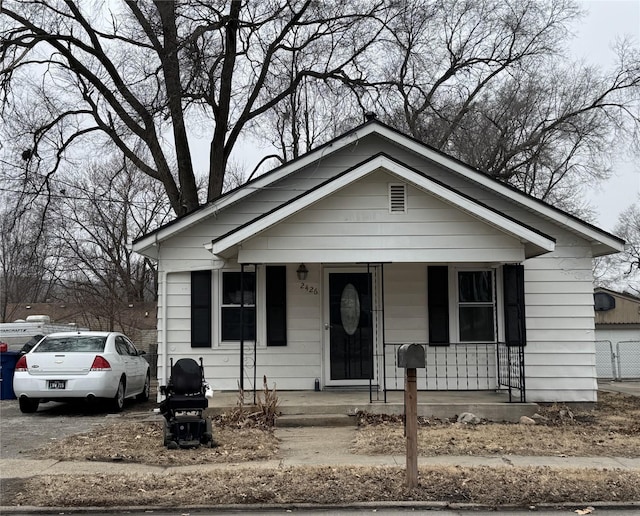 bungalow-style home featuring a porch