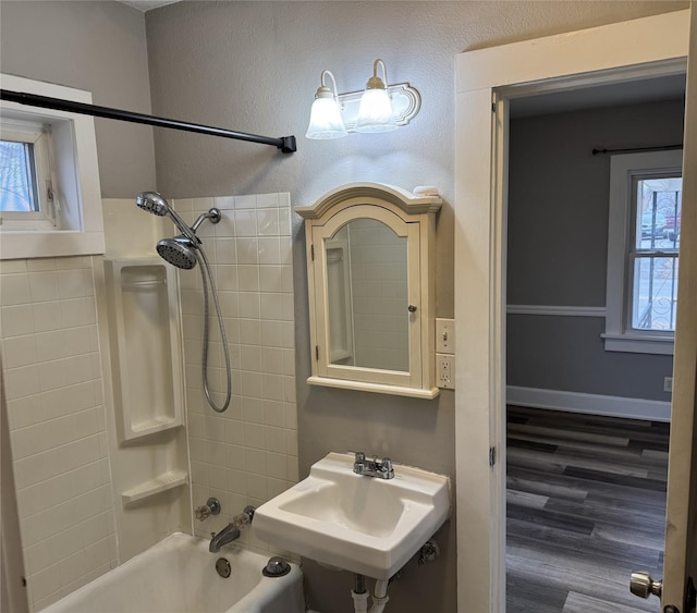 bathroom with sink and  shower combination