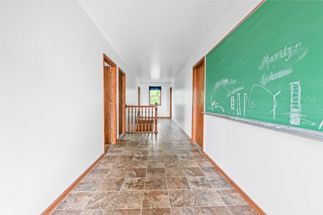 2466 655th Ave, Albia, IA 52531 - hallway with stone finish floors and baseboards