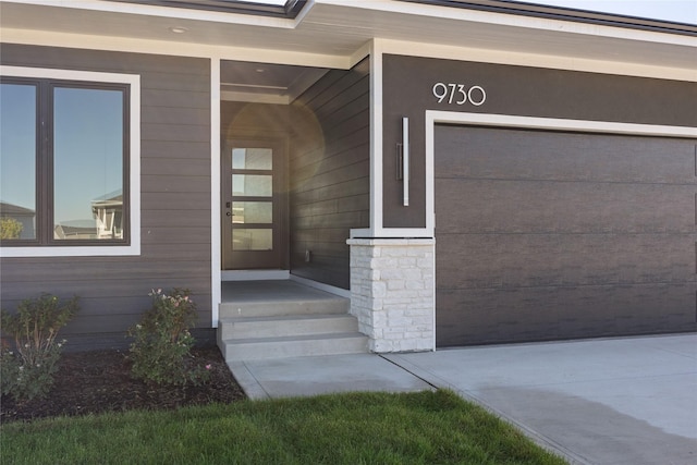 property entrance featuring a garage