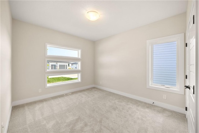 view of carpeted spare room