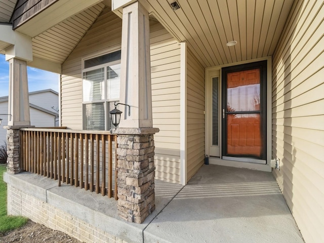 property entrance featuring covered porch